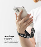 Hand Strap | Lettering - A person holding a phone with a black wrist strap featuring white "LIVE A BETTER" lettering.