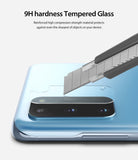 Galaxy S20 Camera Protector | Invisible Defender Glass - Galaxy S20 Camera Protector - A utility knife blade scrapes against a clear tempered glass camera lens protector.