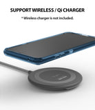 LG V40 ThinQ Case | Fusion - Aqua Blue - Aqua blue phone case hovering above a gray wireless charging pad.