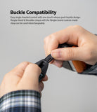 Design Lanyard Strap - Hands demonstrating the one-touch release mechanism of a black Ringke lanyard buckle.