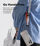 Design Lanyard Strap - Person wearing a grey and orange shoulder strap attached to a clear smartphone case.