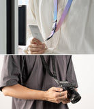 Design Lanyard Strap - Person wearing a blue-pink gradient phone lanyard and another holding a camera with a black strap.