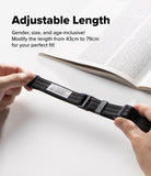 Design Lanyard Strap - A person's hands are shown holding a black adjustable nylon watch strap, stretching it to demonstrate its length-changing feature. An open book is blurred in the background, and bold text at the top reads 'Adjustable Length' with descriptive copy about modifying the length from 43cm to 79cm.