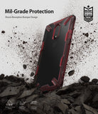 OnePlus 7 Case | Fusion-X - Ruby red Fusion-X case on a OnePlus 7, surrounded by flying debris, highlighting military-grade protection.