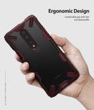 OnePlus 7 Pro Case | Fusion-X - A hand holding a OnePlus 7 Pro in a red and black rugged Fusion-X protective case.