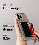Card Holder | Side Slot - Hand holding a phone with a black side-slot card holder, showing 64mm width and 8.2g weight.