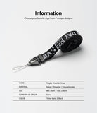 Shoulder Strap | Lettering - Black coiled strap with white text, a plastic connector, and a loop, with product specifications below.