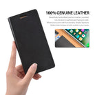 iPhone 8 / 7 Case | Signature - Hand holding a black leather wallet case with an inset showing the phone interior.