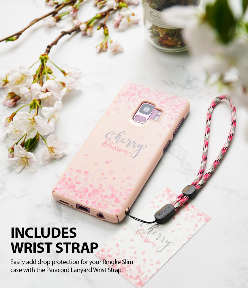 Galaxy S9 Plus Case | Slim (Cherry Blossom) - Pink phone case with cherry blossom pattern and attached wrist strap.