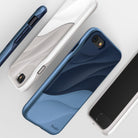iPhone 8 / 7 Case | Wave - Three iPhone cases with wavy, layered designs in blue and white color schemes on a white background.