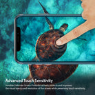 iPhone X Screen Protector | Invisible Defender - Finger touching a sea turtle image on an iPhone X screen.