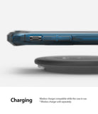 iPhone 11 Pro Case | Fusion-X - Blue translucent phone case hovering above a black wireless charging pad.