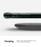 iPhone 11 Pro Max Case | Fusion - Side view of a dark green phone case hovering above a wireless charging pad.