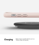 iPhone XR Case | Air-S - Pink Sand iPhone XR case hovering above a black wireless charging pad on a white background.