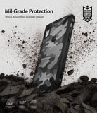 iPhone XR Case | Fusion-X - Camo black iPhone XR case with shock-absorbing bumper, shown amidst flying debris and dirt.