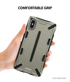 iPhone XS Max Case | Dual-X [DX] - A hand holds a rugged, sand-colored phone case with black accents and a textured grip.