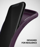 iPhone XS Case | Onyx - A black smartphone being inserted into a flexible, deep purple TPU protective case.