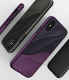 iPhone XS Case | Wave - Metallic purple and black phone cases with a textured, wavy design on a white background.