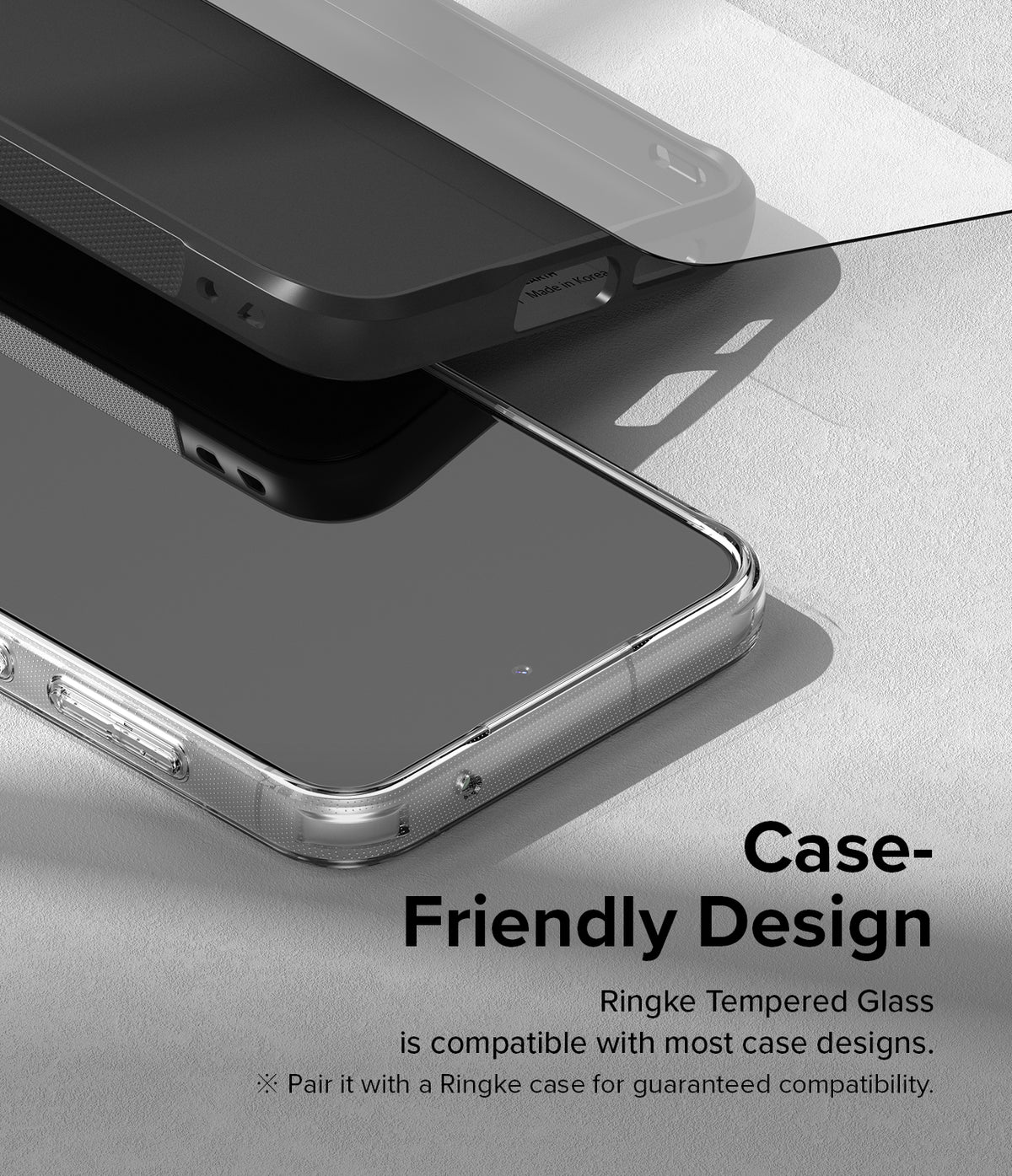 Galaxy S23 FE Screen Protector | Full Cover Glass - Galaxy S23 FE Screen Protector - Tempered glass screen protector hovering above a smartphone inside a protective case.