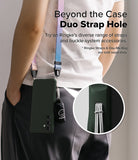 Galaxy S24 FE Case | Onyx - Person wearing a phone case with a dual strap hole, showing a close-up of the strap attachment.