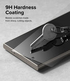 Galaxy S24 Ultra Screen Protector | Easy Slide Tempered Glass - Galaxy S24 Ultra Screen Protector - A metal key resting on a smartphone screen to demonstrate 9H scratch resistance.