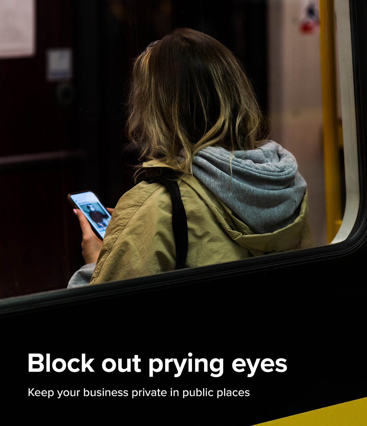 Galaxy S24 Screen Protector | Easy Slide Privacy Tempered Glass - Galaxy S24 Screen Protector - A person in a hoodie uses a smartphone while sitting on a train, highlighting privacy.