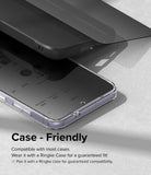 Galaxy S24 Plus Screen Protector | Easy Slide Privacy Tempered Glass - Galaxy S24 Plus Screen Protector - Privacy glass hovering above a smartphone in a clear case, demonstrating case fit.