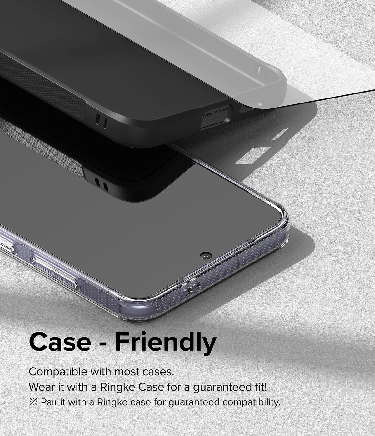 Galaxy S24 Plus Screen Protector | Easy Slide Tempered Glass - Galaxy S24 Plus Screen Protector - Tempered glass screen protector hovering above a smartphone inside a protective case.