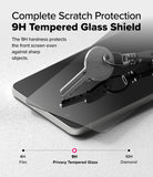 Galaxy S25 Edge Screen Protector | Easy Slide Privacy Tempered Glass - A metal key resting on a 9H tempered glass screen protector atop a smartphone.