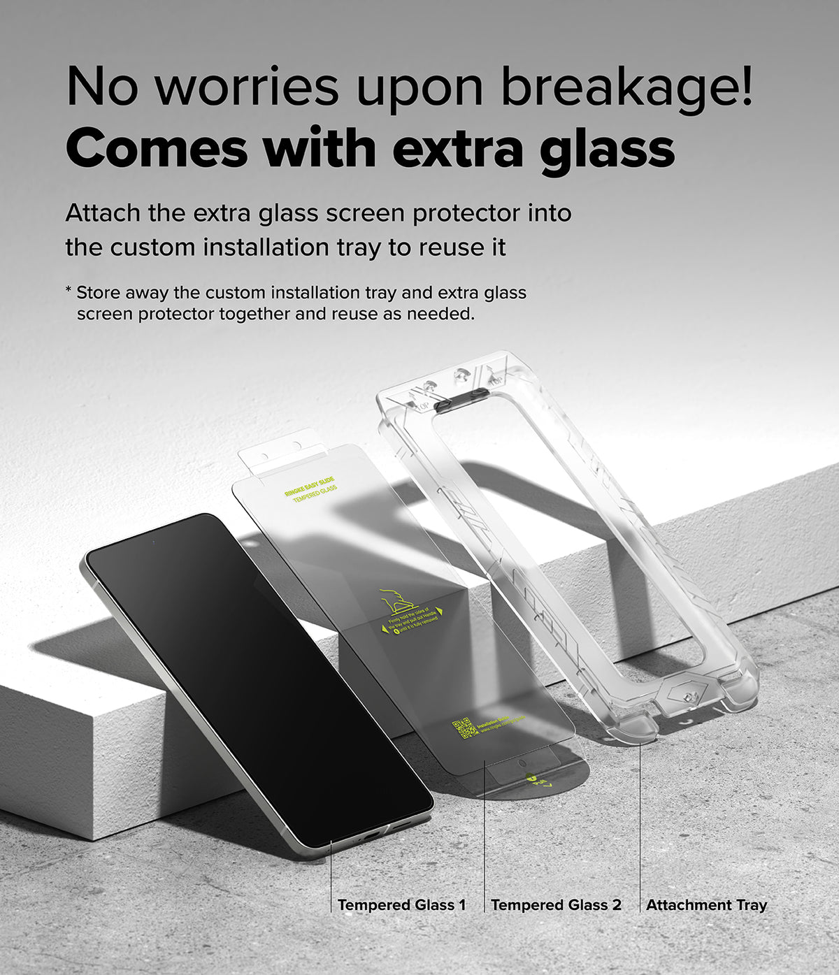 Galaxy S25 Edge Screen Protector | Easy Slide Tempered Glass - Smartphone, two tempered glass protectors, and an installation tray on a gray surface.