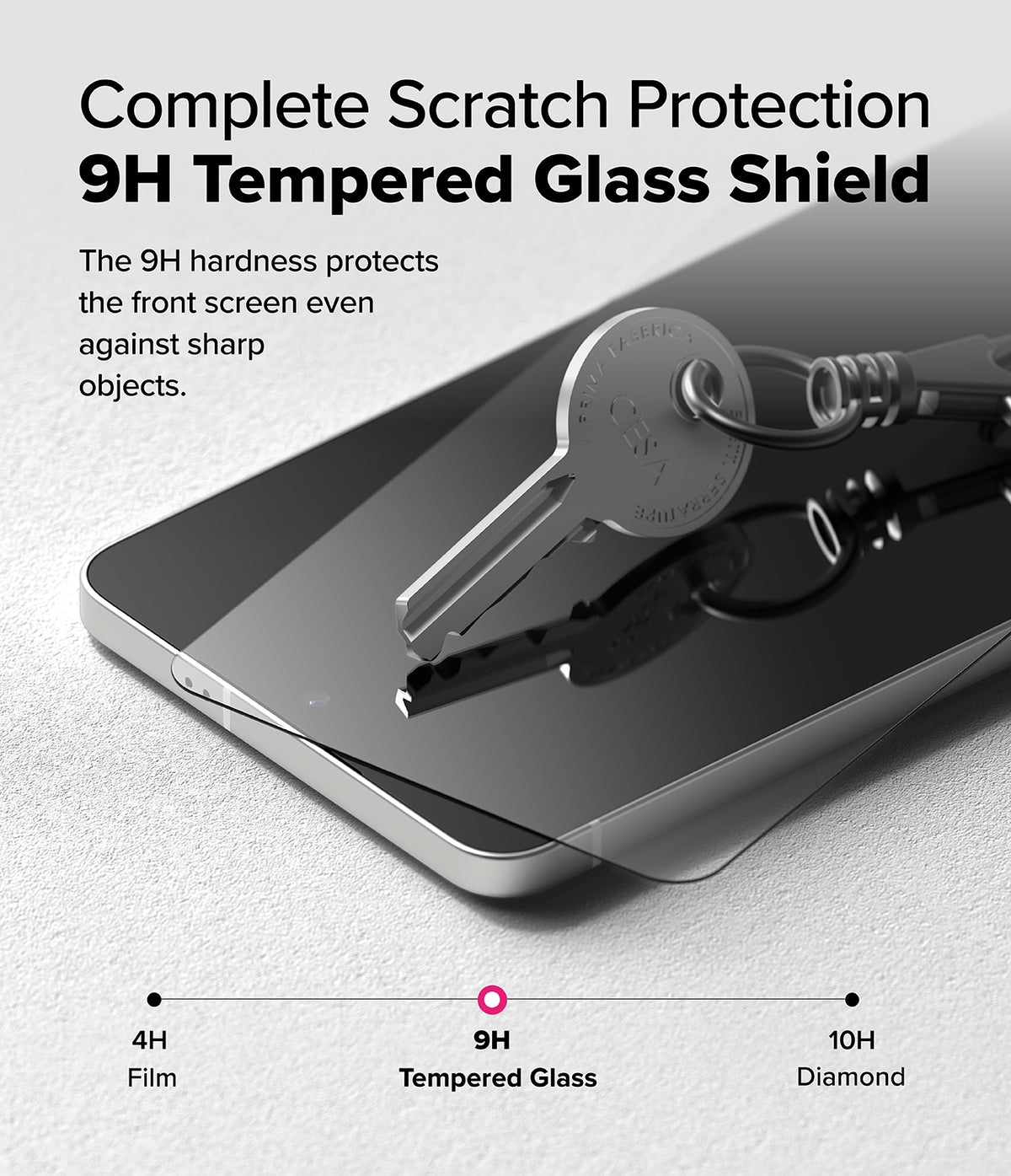 Galaxy S25 Edge Screen Protector | Easy Slide Tempered Glass - A metal key resting on a smartphone screen protected by 9H tempered glass.