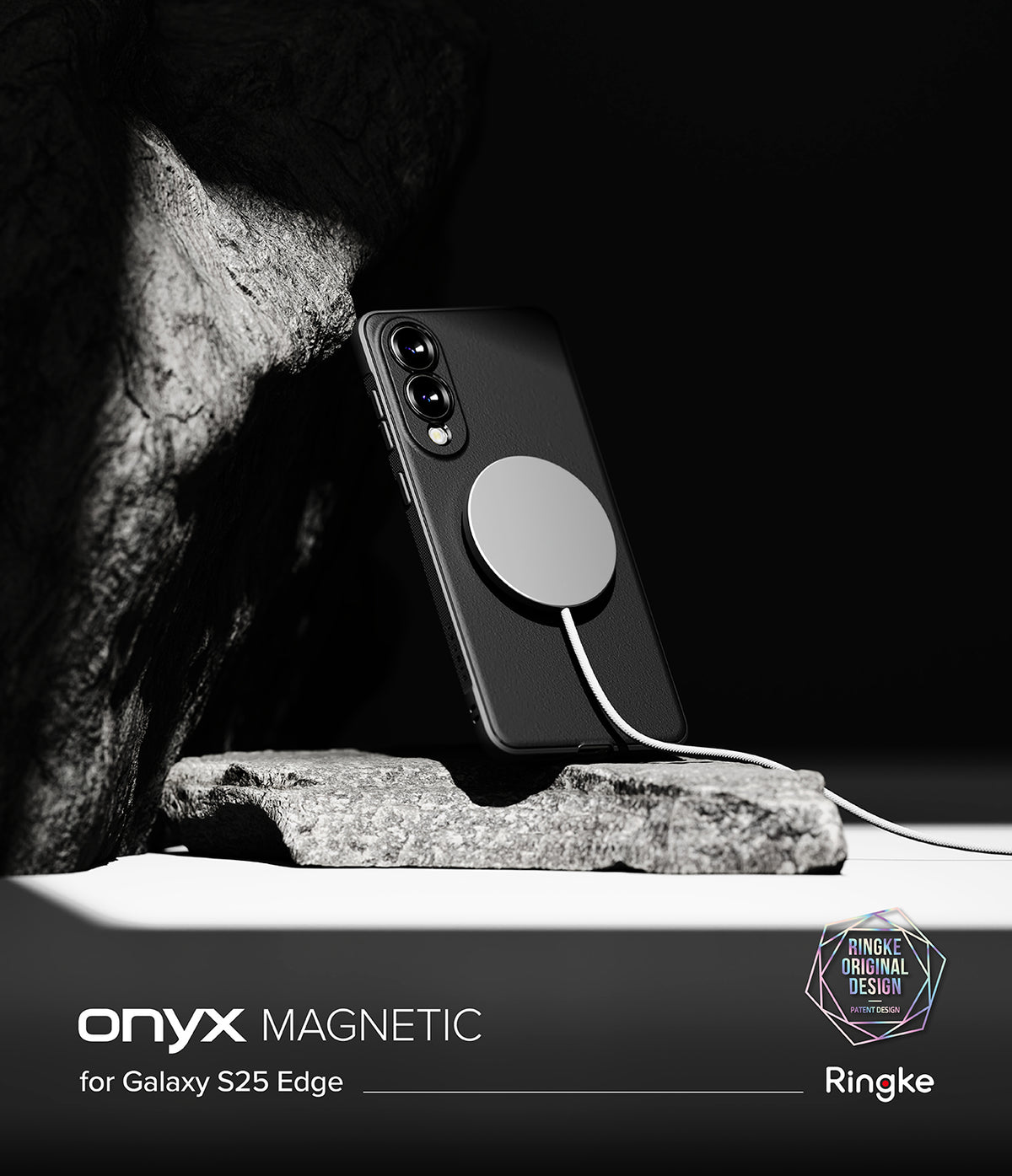 Galaxy S25 Edge Case | Onyx Magnetic - Black phone case with magnetic charger on a stone surface against a dark background.