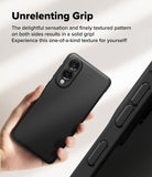Galaxy S25 Edge Case | Onyx Magnetic - Hand holding a black textured phone case showing camera cutouts and side grip.