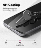 Galaxy S25 FE Screen Protector | Easy Slide Tempered Glass (2P) - Galaxy S25 FE Screen Protector - A metal key resting on a phone screen protector, demonstrating 9H scratch resistance.