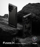 Galaxy S25 Ultra Case | Fusion-X - Two black Fusion-X cases for Galaxy S25 Ultra displayed on dark, jagged volcanic rocks.