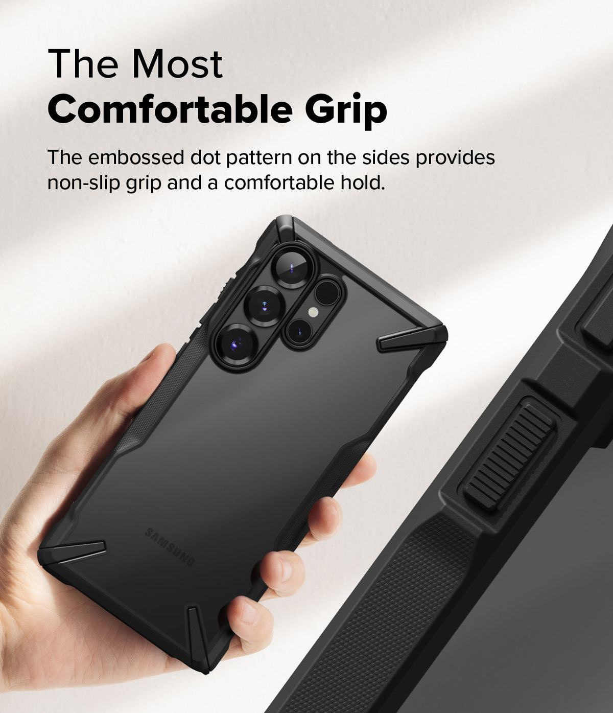 Galaxy S25 Ultra Case | Fusion-X - Hand holding a black phone case with a textured, dotted side grip and reinforced corners.