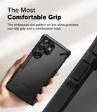 Galaxy S25 Ultra Case | Fusion-X - Hand holding a black phone case with a textured, dotted side grip and reinforced corners.