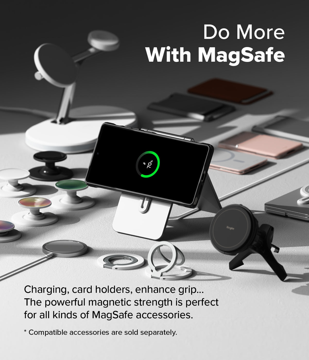 Galaxy S25 Ultra Case | Fusion-X Magnetic - Phone in a magnetic case charging on a stand surrounded by MagSafe accessories.