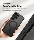 Galaxy S25 Ultra Case | Fusion Bold Magnetic - Hand holding a black phone case with a magnetic ring and textured sides.