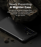 Galaxy S25 Ultra Case | Rugged Gear - Black rugged phone case resting on a dark surface beneath a large, textured rock.