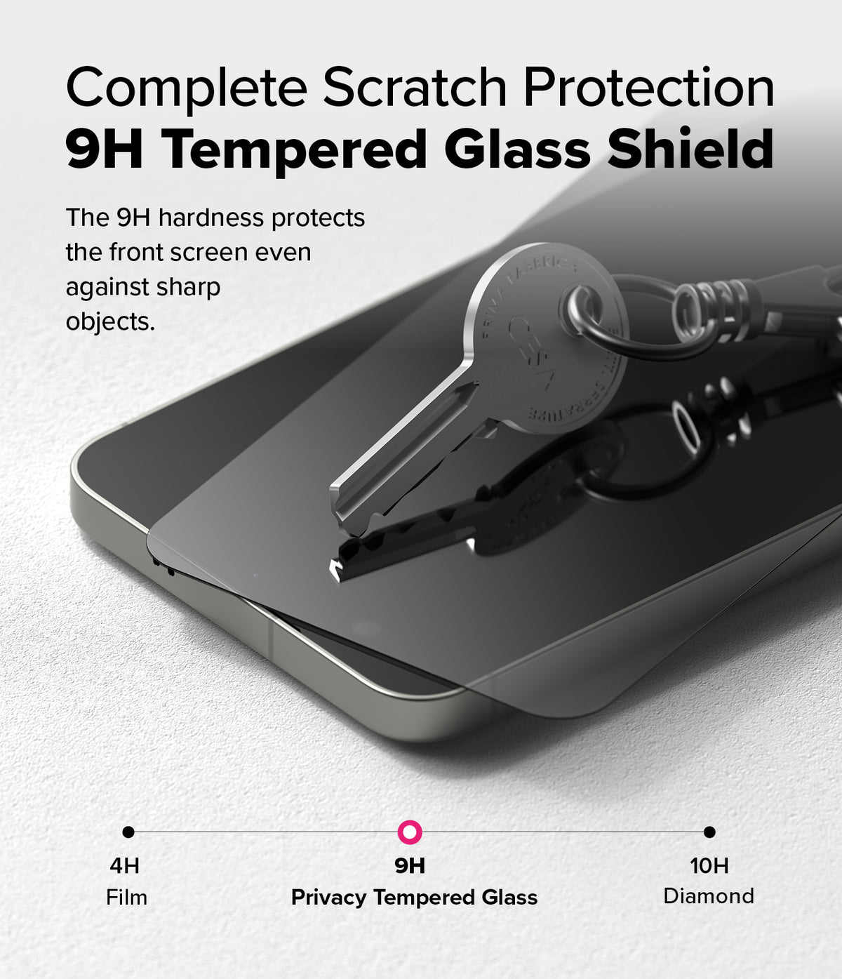 Galaxy S25 Screen Protector | Easy Slide Privacy Tempered Glass - Galaxy S25 Screen Protector - A metal key rests on a 9H tempered glass screen protector atop a smartphone.