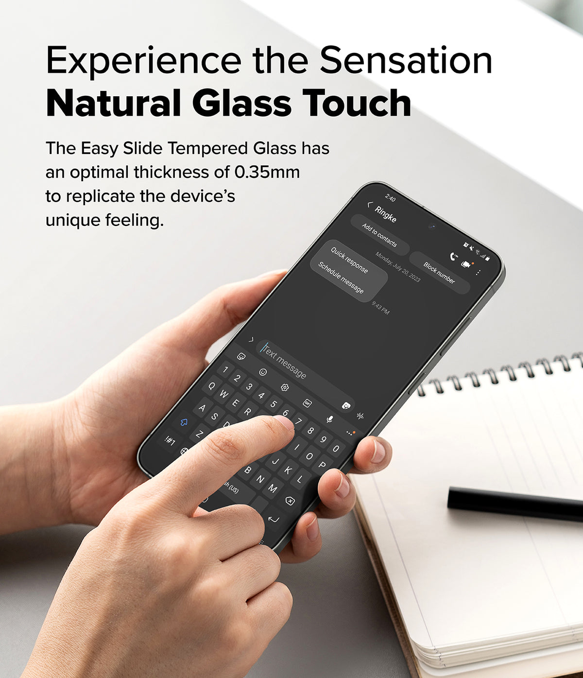 Galaxy S25 Screen Protector | Easy Slide Tempered Glass - Galaxy S25 Screen Protector - Hand holding a smartphone with a 0.35mm tempered glass screen protector while typing.