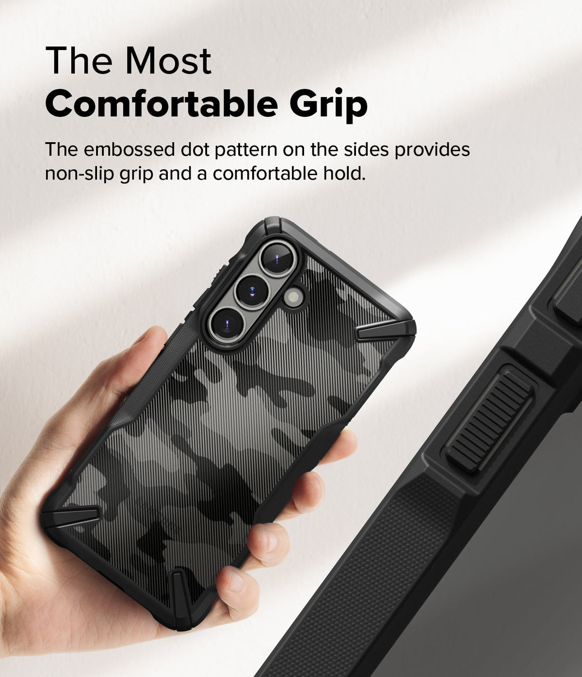 Galaxy S25 Case | Fusion-X - Hand holding a black camo phone case with textured side grips and reinforced corners.