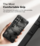 Galaxy S25 Case | Fusion-X - Hand holding a black camo phone case with textured side grips and reinforced corners.