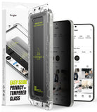Galaxy S25 Screen Protector | Easy Slide Privacy Tempered Glass - Galaxy S25 Screen Protector - Privacy tempered glass in an installation tray next to a smartphone with a dark screen.