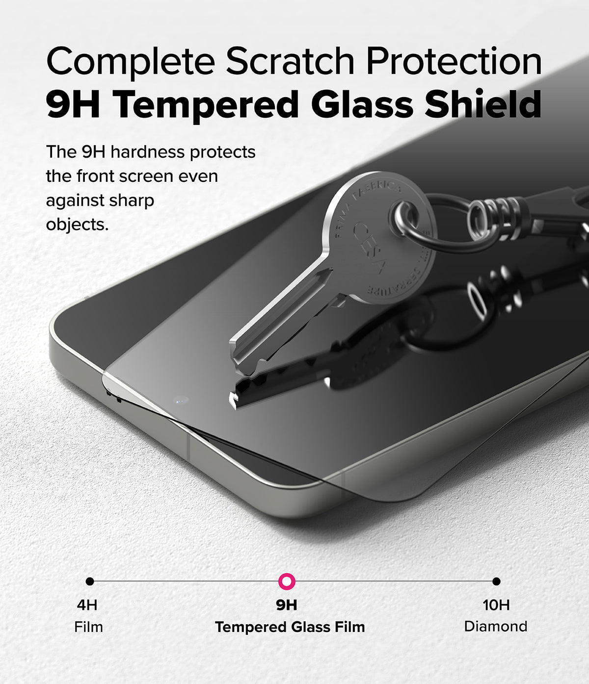 [Bundle] Galaxy S25 | Fusion Magnetic - A key scratching a 9H tempered glass screen protector on a smartphone.