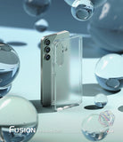 Galaxy S25 Plus Case | Fusion Matte - A matte clear phone case standing beside a Galaxy S25 Plus amidst floating glass orbs.