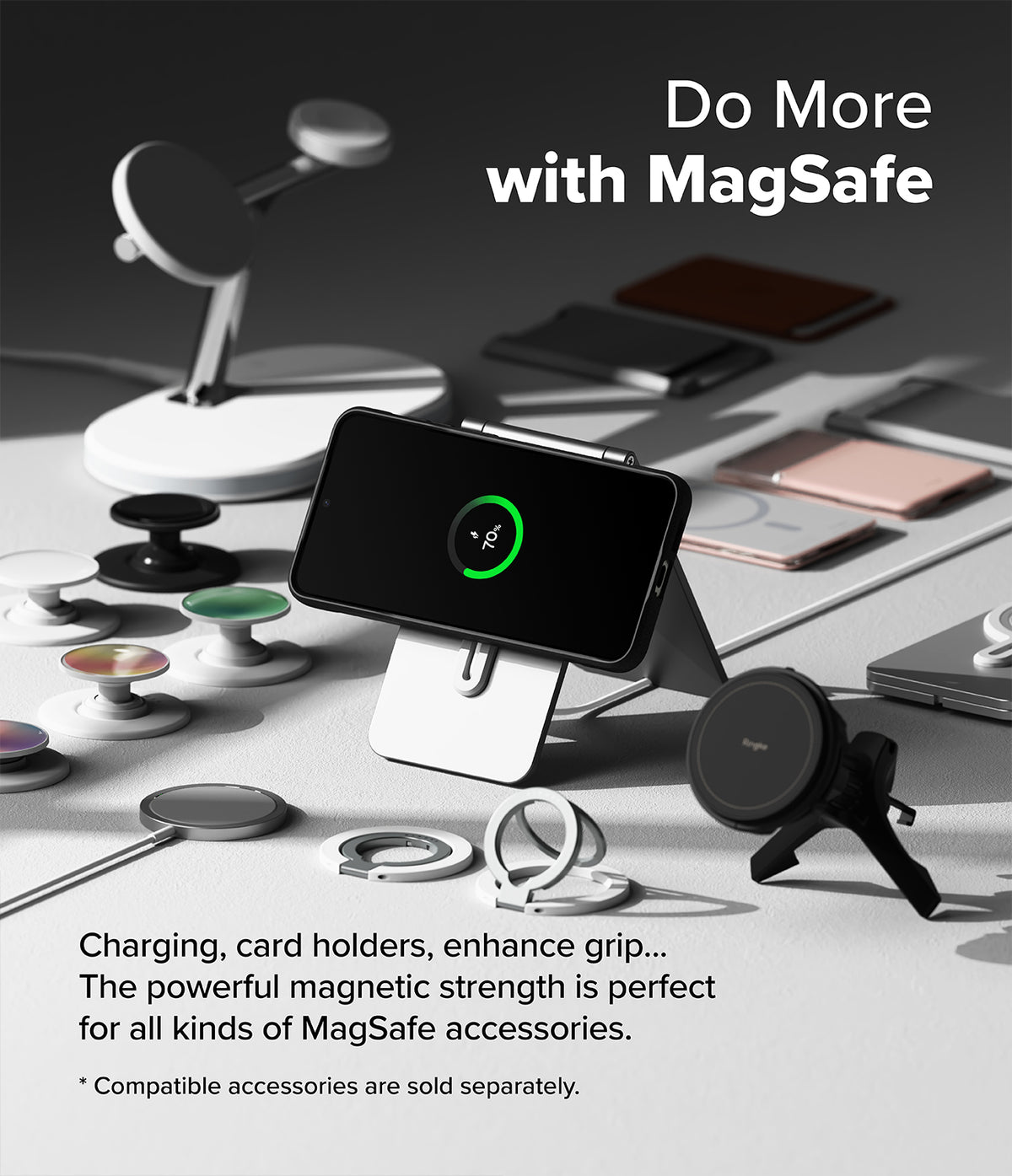 Galaxy S25 Plus Case | Onyx Magnetic - Smartphone in magnetic case charging on a stand surrounded by MagSafe accessories.