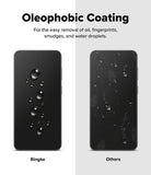 Galaxy S26 FE Screen Protector | Easy Slide Tempered Glass (2P) - Promotional graphic for oleophobic coating on a smartphone screen, showing two black phone mockups side by side with water droplets. The left phone is labeled 'Ringke' and shows water droplets rolling off easily, while the right phone is labeled 'Others' and shows water droplets staying on the surface.