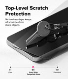 Galaxy S26 FE Screen Protector | Easy Slide Tempered Glass (2P) - A close-up promotional graphic for a smartphone screen protector showing a key resting on the glossy black glass. Large text reads 'Top-Level Scratch Protection' with smaller copy about a 9H hardness layer.